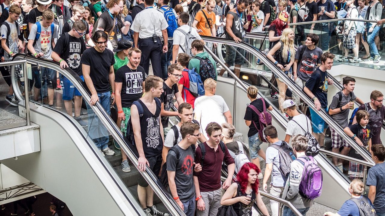 Large crowd of visitors in a hall at Gamescom 2015