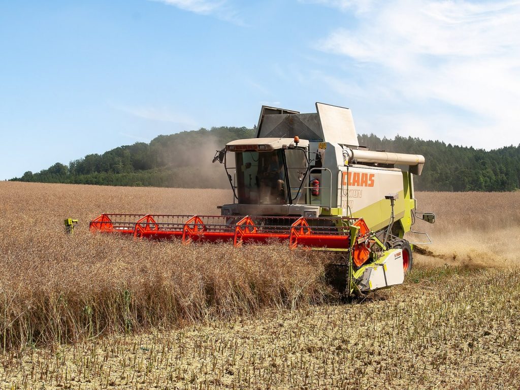 Claas Lexion 480 combine harvester working a grain field